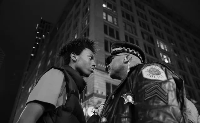 “March Against Police Violence”. Contemporary Issues, third prize singles. John J. Kim, USA, Chicago Tribune. Location: Chicago, Illinois. Lamon Reccord stares down a police sergeant during a protest following the fatal shooting of Laquan McDonald by police in Chicago, Illinois, November 25, 2015. (Photo by John J. Kim/World Press Photo Contest)