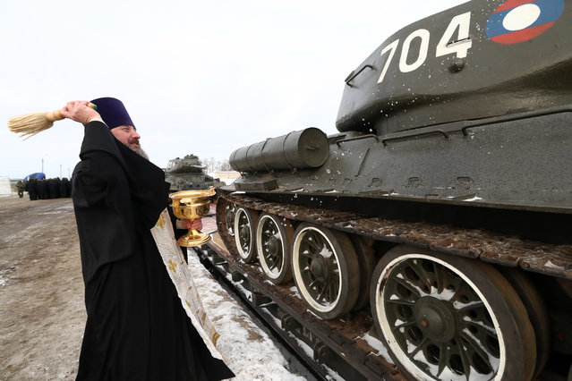 Welcoming thirty Soviet WWII-era T-34 battle tanks handed over by Laos to Russia in the town of Naro-Fominsk outside Moscow, Russia on January 20, 2019. On January 9, 2019, the tanks arrived in the Russian Far Eastern city of Vladivostok to be sent by rail to Naro-Fominsk. Laos' Defence Ministry handed over the tanks as part of the Lao-Russian military cooperation programme. The tanks are to be used in military parades and films about the Second World War. (Photo by Stanislav Krasilnikov/TASS)