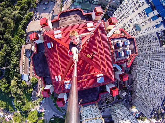Yaroslav Segeda takes a selfie on top of a building. (Photo by Yaroslav Segeda/Solent News)