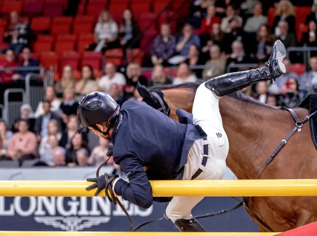 Beat Maendli of Switzerland falls off Dsarie during the FEI World Cup Final 1 Show Jumping event at Gothenburg Horse Show in Scandinavium arena, Sweden April 4, 2019. (Photo by Bjorn Larsson Rosvall/TT News Agency via Reuters)