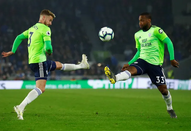 Cardiff City's Joe Bennett and Junior Hoilett in action during the Premier League match between Brighton & Hove Albion and Cardiff City at American Express Community Stadium on April 16, 2019 in Brighton, United Kingdom. (Photo by Eddie Keogh/Reuters)