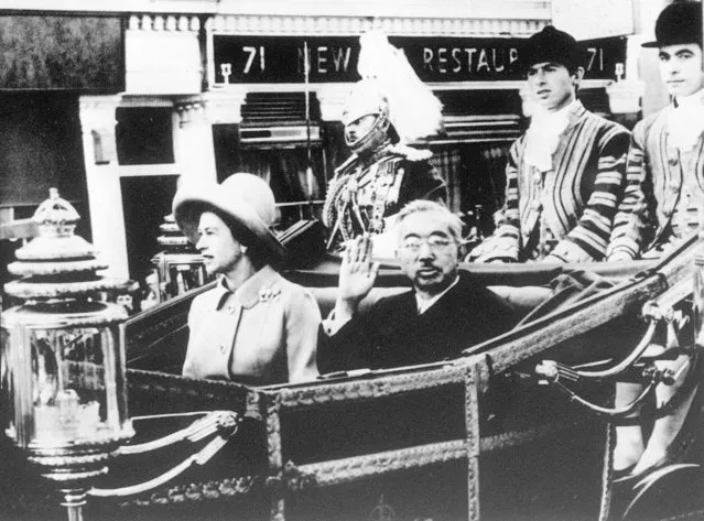In this October 5, 1971, photo, Emperor Hirohito, center right, and Queen Elizabeth II, center left, are in carriage on their way to the Buckingham Palace as part of his tour to Europe. The Japanese Emperor Akihito’s expression of “deep remorse” for World War II is in keeping with what by all appearances has become his mission: to make amends for a war fought in the name of his father, Hirohito. For the last time in his 30-year reign, Emperor Akihito addressed an annual memorial service Wednesday, Aug. 15, 2018, marking the end of World War II. (Photo by Kyodo News via AP Photo)