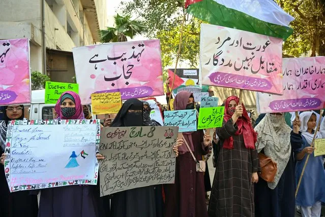 Jamaat-e-Islami (JI) party activists demonstrate to mark International Women's Day, in Karachi on March 8, 2024. (Photo by Asif Hassan/AFP Photo)