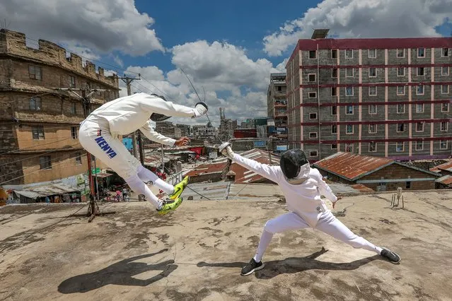 Kenyan professional fencer Isaac Mburu Wanyoike (L) trains with teenage members of the Tsavora Fencing Mtaani club on a rooftop of the Huruma slum in Mathare, Nairobi, Kenya, 17 April 2024. The Tsavora Fencing Mtaani club was founded by Isaac Mburu Wanyoike, a gang member turned pro-fencer, the first Kenyan to represent the country in international fencing competitions, and the current coach for Kenya’s Fencing team. “I wanted to change to be an example in the community, a positive figure”, Mburu said. Mburu is bringing a new hope to Kenyan youths in the Huruma slum by engaging them in fencing, using the streets as their arena as they parry and riposte in front of curious onlookers. They also go to Nairobi’s central business district to show-fence to members of the public as a way to raise funds that support them in acquiring training kits and building a dedicated facility. Tsavora depends in part on the will of the people, although much of its budget comes from fee-paying international school programs and private classes. More than a hobby for the young athletes, fencing has helped them carve a path away from crime, drug abuse, teenage pregnancies and other social pressures. Today the club has 45 students and has become a reference for the suburb of Mathare, the second largest suburb of Nairobi. Mburu will travel to Algeria to take part in the Zonal Qualifying Tournament for the 2024 Paris Olympics qualifiers. (Photo by Daniel Irungu/EPA/EFE)