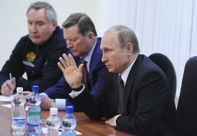 (R-L) Russian President Vladimir Putin, Chief of president's staff Sergei Ivanov and Deputy Prime Minister Dmitry Rogozin attend a meeting with space officials after the inaugural launch of a Soyuz rocket was called off because of a technical fault at the Vostochny cosmodrome  in the far eastern Amur region, Russia, April 27, 2016. (Photo by Mikhail Klimentyev/Reuters/Sputnik/Kremlin)