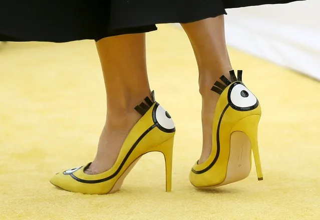 Actress Sandra Bullock wears Minon themed shoes as she poses at the premiere of the film “Minions”, in Los Angeles, June 27, 2015. (Photo by Danny Moloshok/Reuters)