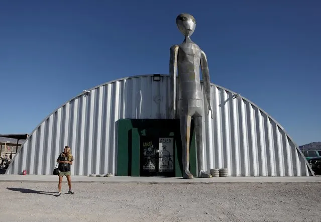 People visit the Alien Research Center in Hiko, as an influx of tourists responding to a call to “storm” Area 51, a secretive U.S. military base believed by UFO enthusiasts to hold government secrets about extra-terrestrials, is expected in Rachel, Nevada, U.S. September 19, 2019. (Photo by Jim Urquhart/Reuters)