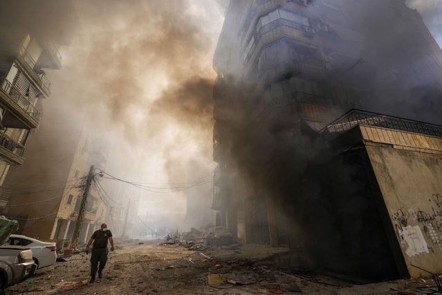 Smoke rises from the site of an Israeli airstrike in Dahiyeh, Beirut, Lebanon, Wednesday, October 2, 2024. (Photo by Hassan Ammar/AP Photo)