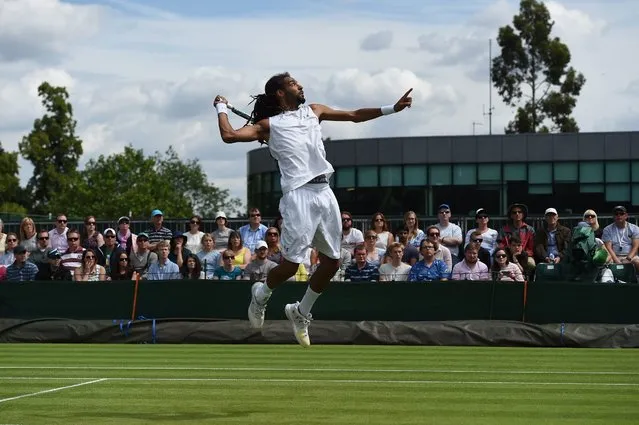 Dustin Brown of Germany during his second round match against Dusan Lajovic of Serbia at the Wimbledon Championships, All England Lawn Tennis Club, in London, Britain, 28 June 2016. (Photo by Andy Rain/EPA)