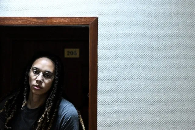 US Women National Basketball Association's (NBA) basketball player Brittney Griner, who was detained at Moscow's Sheremetyevo airport and later charged with illegal possession of cannabis, is escorted to the courtroom to hear the court's final decision in Khimki outside Moscow, on August 4, 2022. Russian prosecutors requested that US basketball star Brittney Griner be sentenced to nine and a half years in prison on drug smuggling charges. Her hearing comes with tensions soaring between Moscow and Washington over Russia's military intervention in Ukraine that has sparked international condemnation and a litany of Western sanctions. (Photo by Kirill Kudryavtsev/Pool via AFP Photo)