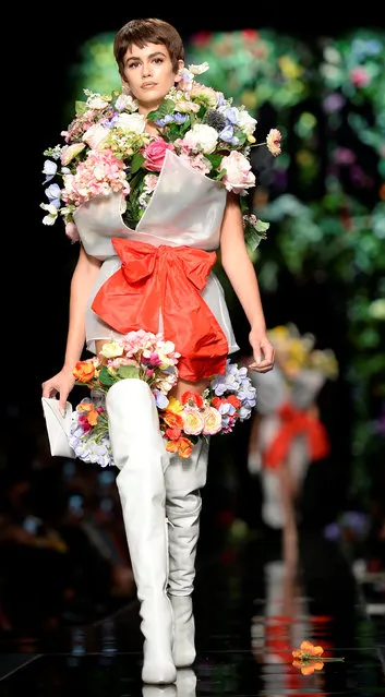 A model displays a creation from the Moschino Spring/Summer 2018 show at the Milan Fashion Week in Milan, Italy, September 21, 2017. (Photo by Massimo Pinca/Reuters)