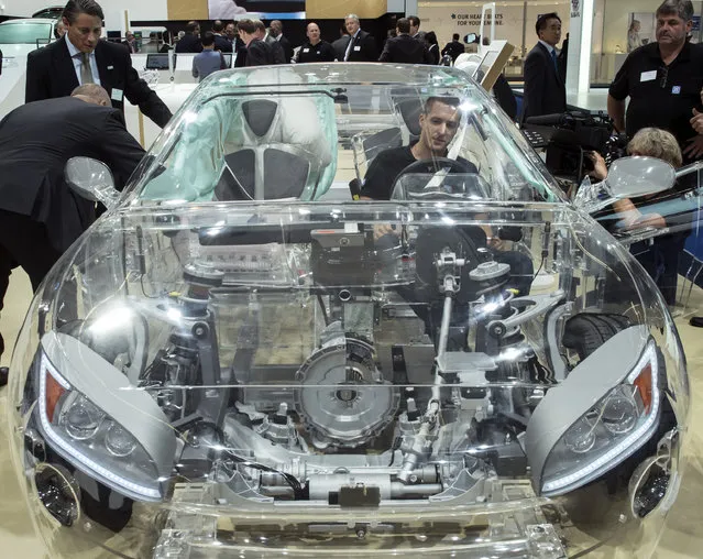 The transparent car of ZF company equipped with different security systems is presented on the second press day of the Frankfurt Auto Show IAA Frankfurt, Germany, Wednesday, September 16, 2015. The car show runs through Sept. 27. (Photo by Jens Meyer/AP Photo)