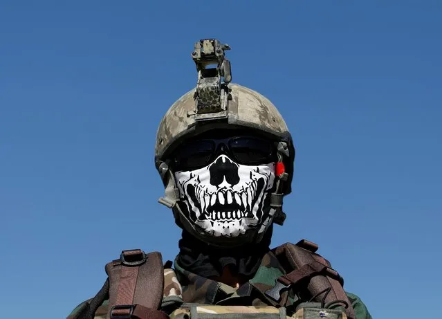 An Afghan Special Forces member attends his graduation ceremony in Kabul, Afghanistan on June 17, 2020. (Photo by Mohammad Ismai/Reuters)