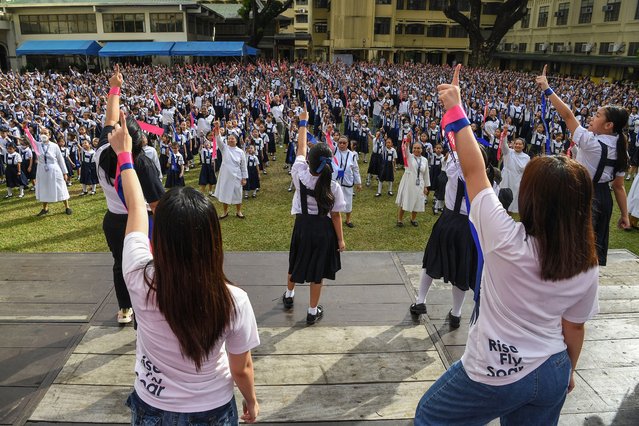 Students and nuns dance during global action on violence against women and children dubbed “one billion rising”, to coincide with Valentine's day, at St. Scholastica's College in Manila on February 14, 2025. (Photo by Ted Aljibe/AFP Photo)