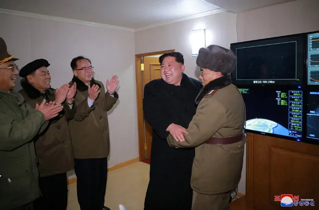 North Korea's leader Kim Jong Un is seen as the newly developed intercontinental ballistic rocket Hwasong-15's test was successfully launched, in this undated photo released by North Korea's Korean Central News Agency (KCNA) in Pyongyang November 30, 2017. (Photo by Reuters/KCNA)