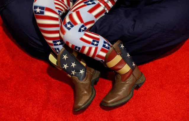 A young girl wears patriotic boots and leggings at the Conservative Political Action Conference (CPAC) at National Harbor, Md., February 22, 2018. (Photo by Kevin Lamarque/Reuters)