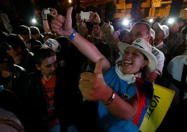 Supporters of “No” vote celebrate after the nation voted “No” in a referendum on a peace deal between the government and Revolutionary Armed Forces of Colombia (FARC) rebels, in Bogota, Colombia, October 2, 2016. (Photo by John Vizcaino/Reuters)