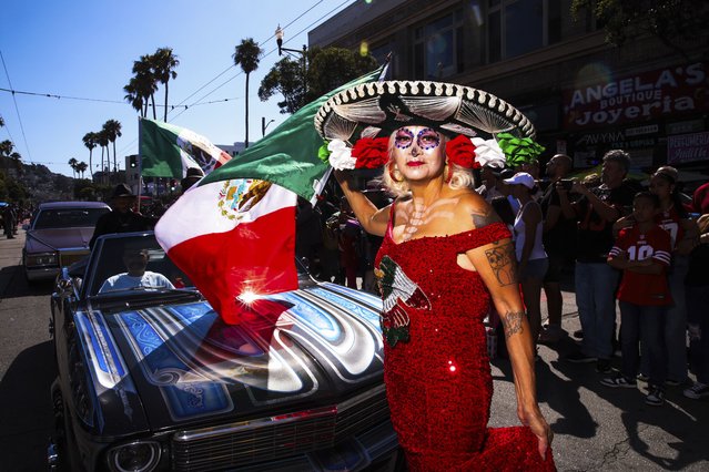 Lydia Rioss of Sacramento, poses for a portrait during King of the Streets, the world's first televised and streamed lowrider parade, in San Francisco's Mission District on Saturday, September 20, 2025. The event, as part of National Latino-Hispanic Heritage Month, is sponsored by the S.F. Lowrider Council in conjunction with the city at the Mission Merchants Association. (Photo by Yalonda M. James/San Francisco Chronicle via AP Photo)