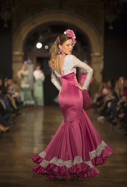 A model presents a creation by Maria Amador during the “We Love Flamenco” fashion show in the Andalusian capital of Seville January 14, 2015. (Photo by Marcelo del Pozo/Reuters)