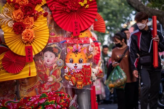 Stickers with cat image are on display at the Spring Festival Fair in the Old Quarter on January 14, 2023 in Hanoi, Vietnam. (Photo by Linh Pham/Getty Images)