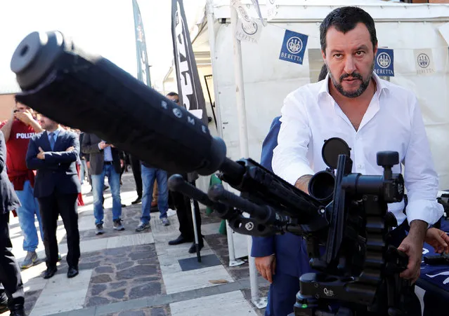 Italian Interior Minister Matteo Salvini stands next to a sniper rifle during a visit to celebrate the anniversary of the Central Security Operations Service (NOCS), a SWAT team of the Polizia di Stato in Rome, Italy October 10, 2018. (Photo by Remo Casilli/Reuters)