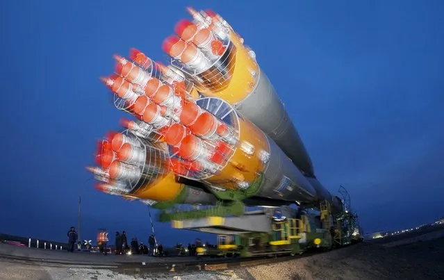 The Soyuz TMA-20M for the next International Space Station (ISS) crew of Jeff Williams of the U.S. and Oleg Skriprochka and Alexey Ovchinin of Russia is transported from an assembling hangar to the launchpad ahead of its launch scheduled on March 19, at the Baikonur cosmodrome in Kazakhstan March 16, 2016. (Photo by Shamil Zhumatov/Reuters)