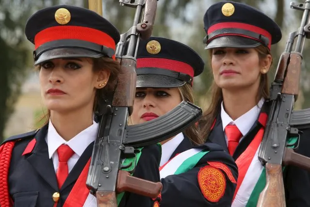 Female Kurdish Peshmerga take part in their graduation ceremony at a police academy in Zakho district of the Dohuk Governorate of the Iraqi Kurdistan province, Iraq March 30, 2016. (Photo by Ari Jalal/Reuters)