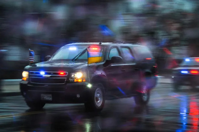 The motorcade carrying Ukrainian Prime Minister Arseniy Yatsenyuk leaves the White House after meeting with President Barack Obama. March, 12, 2014 in Washington, DC. (Photo by Craig Hudson/For The Washington Post)