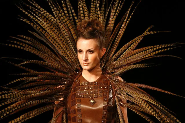 A model presents a creation at the 3rd Salon du Chocolat (Zurich Chocolate Show) in Zurich April 4, 2014. (Photo by Arnd Wiegmann/Reuters)