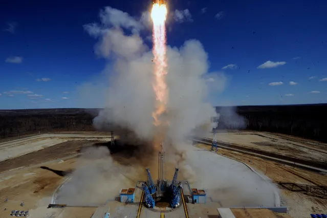 A Russian Soyuz 2.1a rocket carrying Lomonosov, Aist-2D and SamSat-218 satellites lifts off from the launch pad at the new Vostochny Cosmodrome outside the city of Uglegorsk, about 200 kilometers (125 miles) from the city of Blagoveshchensk in the far eastern Amur region Thursday, April 28, 2016. The launch of the first rocket from Russia's new space facility has been delayed after a last-minute problem. (Photo by Kirill Kudryavtsev/Pool Photo via AP Photo)