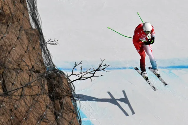 Switzerland's Justin Murisier competes in the men's alpine combined downhill event during the Beijing 2022 Winter Olympic Games at the Yanqing National Alpine Skiing Centre in Yanqing on February 10, 2022. (Photo by Francois-Xavier Marit/AFP Photo)