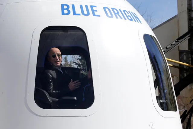 Amazon and Blue Origin founder Jeff Bezos addresses the media about the New Shepard rocket booster and Crew Capsule mockup at the 33rd Space Symposium in Colorado Springs, Colorado, United States April 5, 2017. (Photo by Isaiah J. Downing/Reuters)