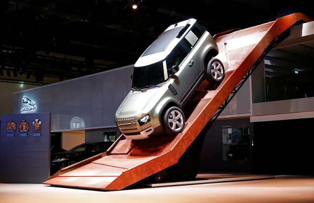 Jaguar Land Rover Defender 90 is pictured at a steep track during a demo at the 2019 Frankfurt Motor Show (IAA) in Frankfurt, Germany, September 10, 2019. (Photo by Wolfgang Rattay/Reuters)