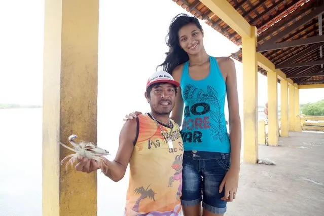 At 6ft 8ins Elisany is the tallest teen in Brazil. (Photo by Barcroft Media)