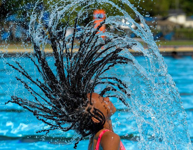 K’Sea Thomas flips her hair at Pratt Pool in Prattville, Ala. on July 11, 2024. (Photo by Mickey Welsh/The Montgomery Advertiser/USA TODAY Network)