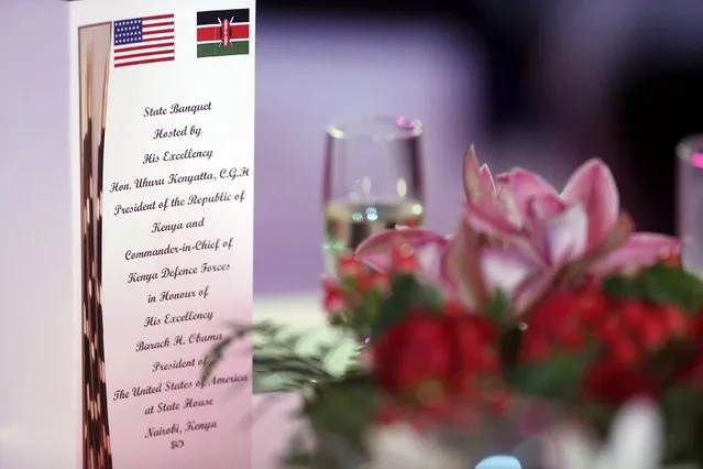 A program sits on a table as U.S. President Barack Obama and Kenya's President Uhuru Kenyatta (not pictured) deliver toasts at the end of a state dinner in Obama's honor at the State House in Nairobi July 25, 2015. (Photo by Jonathan Ernst/Reuters)