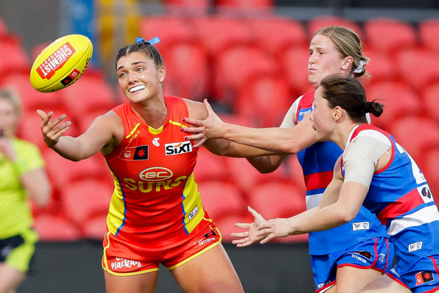 Darcie Davies of the Suns in action during the 2024 AFLW Practice Match between the Gold Coast SUNS and the Western Bulldogs at People First Stadium on August 17, 2024 in Gold Coast, Australia. (Photo by Russell Freeman/AFL Photos via Getty Images)