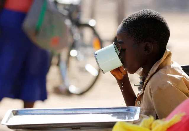 A child drinks water from a cup in drought-hit Masvingo, Zimbabwe, June 1,2016. (Photo by Philimon Bulawayo/Reuters)