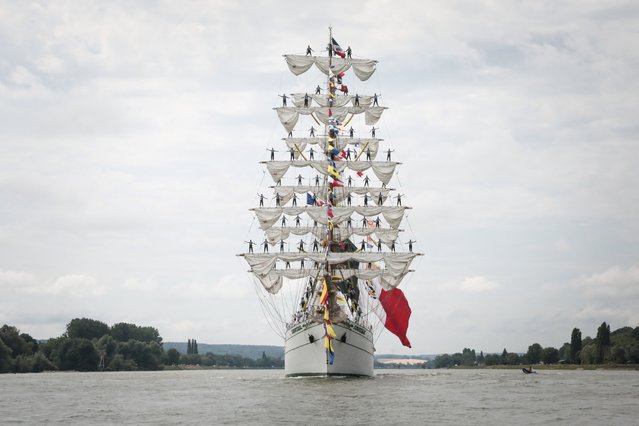 The Cuauhtemoc ship sails during the Grand Parade, as the ships sail from Rouen to the ocean through the Seine river, during the Armada of old vessels and tall ships in Rouen, on June 18, 2023. (Photo by Lou Benoist/AFP Photo)