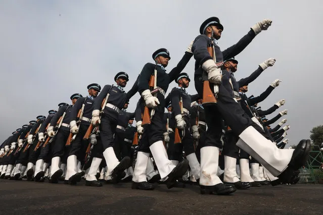 Indian Paramilitary soldiers march during a Republic Day parade rehearsal in New Delhi, India, 17 January 2020. India will celeb​rate Republic Day on 26 January 2020. (Photo by Rajat Gupta/EPA/EFE)