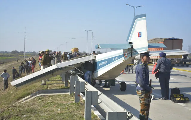 A two seater aircraft of the National Cadet Corps makes emergency landing on the Eastern Peripheral Expressway, on January 23, 2020 in Ghaziabad, India. The pilots landed the aircraft safely on busy expressway after it developed snag. (Photo by Sakib Ali/Hindustan Times/Shutterstock)