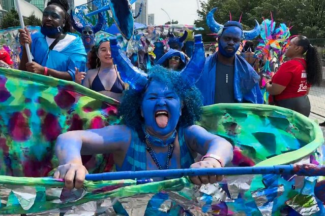 Dancers march during the parade of Caribana, one of the largest Caribbean festivals in North America, in Toronto, Ontario, Canada on August 5, 2023. (Photo by Kyaw Soe Oo/Reuters)