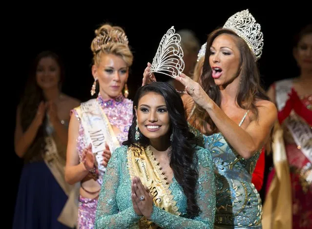 Ashley Burnham of Canada reacts as she wins the “Mrs Universe 2015” contest in Minsk, Belarus, August 29, 2015. (Photo by Vasily Fedosenko/Reuters)