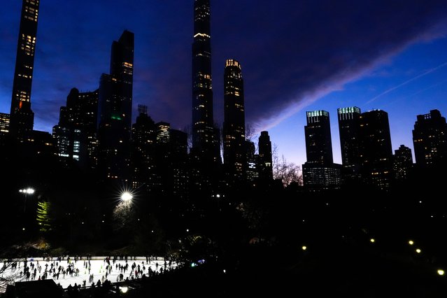 People ice skate at Central Park's Wollman Rink, Thursday, December 12, 2024, in New York. (Photo by Julia Demaree Nikhinson/AP Photo)