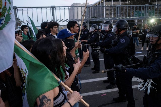 People protest during a rally against the arrests and deportations of migrants by U.S. government agencies in Los Angeles, California, U.S. February 3, 2025. (Photo by Joel Angel Juarez/Reuters)