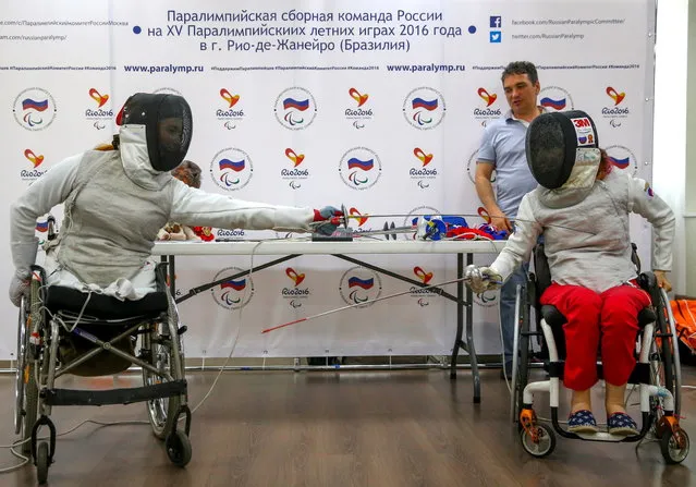 Anna Petukhova (L) and Kseniya Ovsyannikov, members of the Russian wheelchair fencing team, at a press conference on the 2016 Summer Paralympic Games. (Photo by Vladimir Gerdo/TASS via Getty Images)