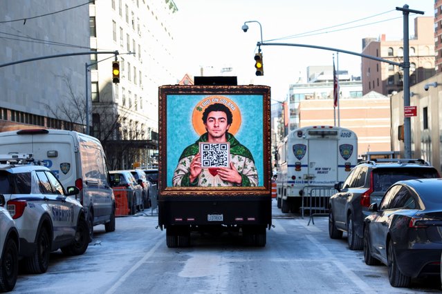 An image depicting Luigi Mangione, the suspect in the killing of UnitedHealth Group chief executive Brian Thompson, is shown on a vehicle, on the day Mangione is expected to attend a hearing in Manhattan Supreme Court on New York state murder and terrorism charges in New York City, U.S., February 21, 2025. (Photo by Brendan McDermid/Reuters)