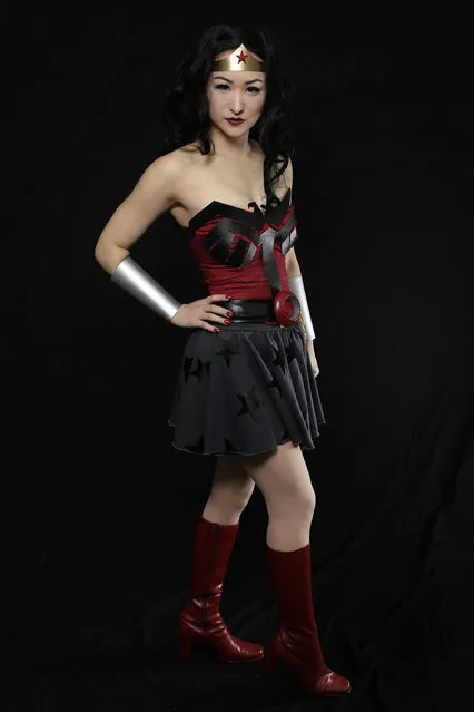 Comic Con attendee Jenni Mostflogged poses as Red Sun Wonder Woman during the 2014 New York Comic Con at Jacob Javitz Center on October 9, 2014 in New York City. (Photo by Neilson Barnard/Getty Images)