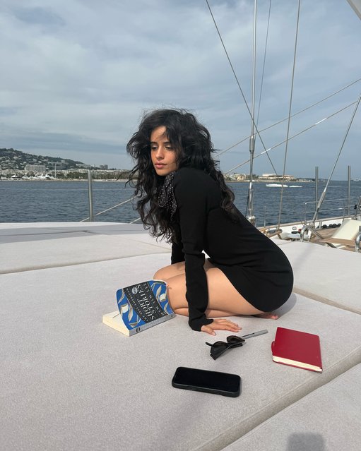 American singer and songwriter Camila Cabello does some reading on a boat on May 19, 2025. (Photo by camila_cabello/Instagram)