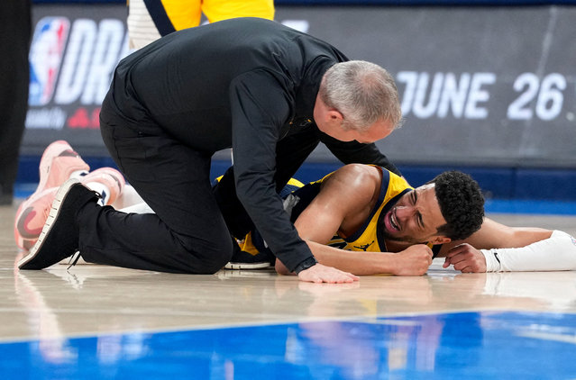 Indiana Pacers guard Tyrese Haliburton reacts after suffering an injury during the first quarter against the Oklahoma City Thunder during game seven of the 2025 NBA Finals on June 23, 2025. (Photo by Kyle Terada/Reuters)